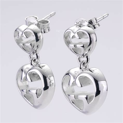 gucci earrings heart silver|Gucci britt silver drop earrings.